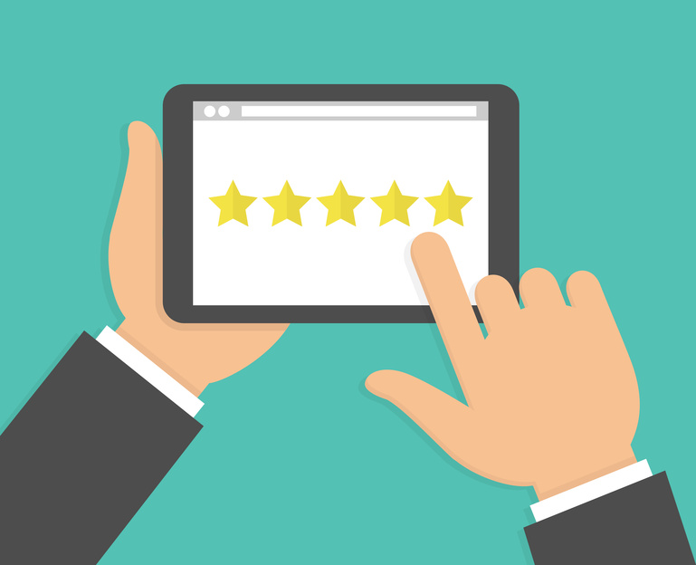 Hand holding and pointing to a tablet with five star on the screen. Rating and review concept. Flat design